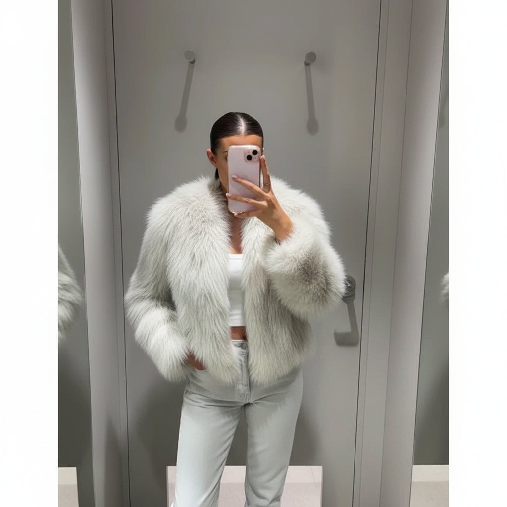 Manteau court fausse fourrure