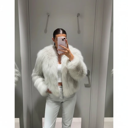 Manteau court fausse fourrure