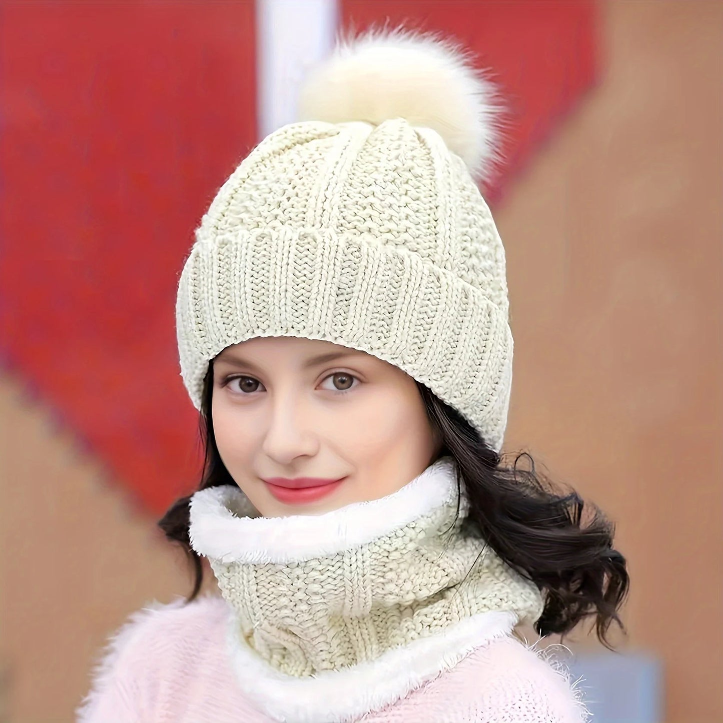 Bonnet en tricot avec pompon